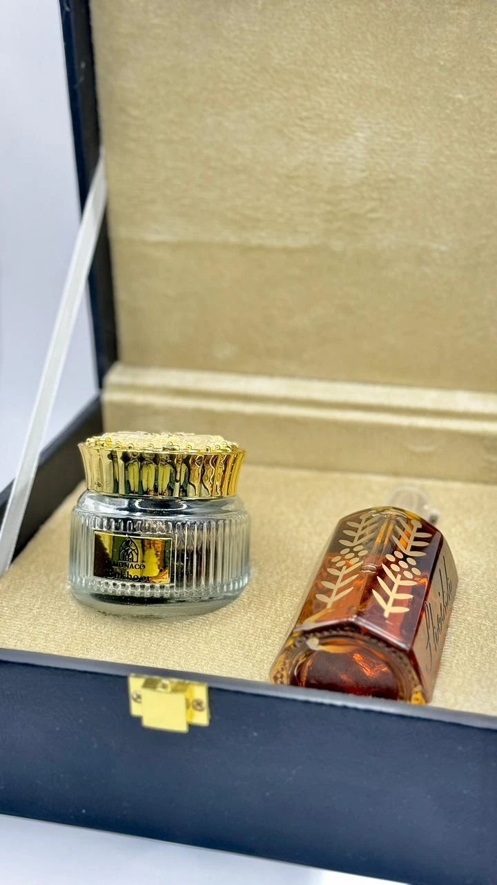 A leather gift box containing Oud Sheikh or any perfume of your choice in a 100ml tola size.